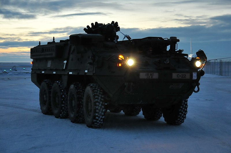 A U.S. Army Alaska Stryker from Bravo Company, 3-21 Infantry Regiment, 1st Stryker Brigade Combat Team, drives down the flight line after offloading from an Air Force C-17 Globemaster above the Arctic Circle as part of Operation Arctic Pegasus at Deadhorse, Alaska, Nov. 3, 2015Arctic Pegasus is U.S. Army Alaska's annual joint exercise designed to test rapid-deployment and readiness in the Arctic. The exercise marks the first time Strykers have deployed above the Arctic Circle. The 1st Stryker Brigade Combat Team is the Army's northernmost unit and has the unique capability to deploy and operate in extreme cold regions. (Photo by Sgt. 1st Class Joel Gibson, U.S. Army Alaska Public Affairs. .. Fot. Wikimedia.commons.org)